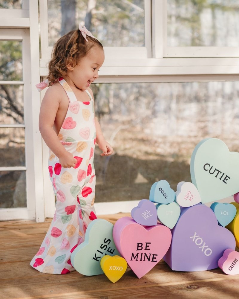 Andi Pleated Bell Bottom Jumpsuit - Conversation Hearts product_type - Bailey&